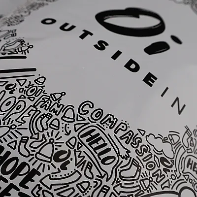 Close up of detailed print on mailing bag